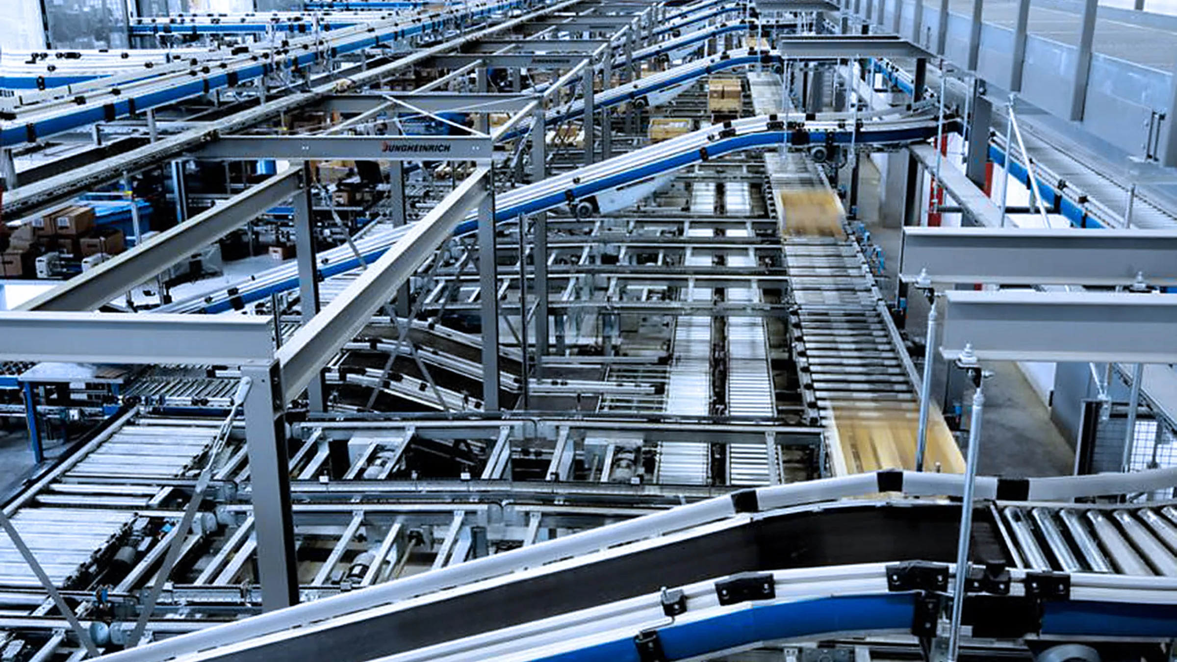 High-speed sortation and conveyor system routing parcels